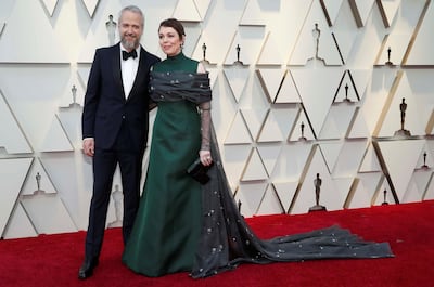 Olivia Colman and husband Ed Sinclair at the 2019 Oscars. Reuters