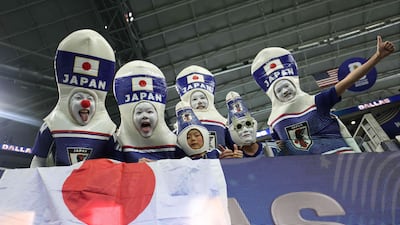 Japan fans cheer from the stands during the Group F game between Netherlands and Japan at Dallas Stadium in Arlington, Texas. AFP