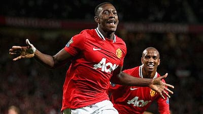Danny Welbeck celebrates scoring the first goal for Manchester United in their clinical 3-0 win against Tottenham.