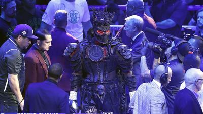 Deontay Wilder enters the ring ahead of his title fight against Tyson Fury. The American would blame the weight of the costume for draining his energy and the defeat that followed. EPA