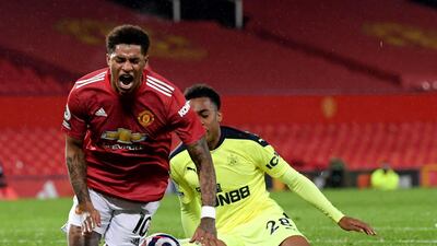 Newcastle United's Joe Willock fouls Marcus Rashford, resulting in a penalty. PA