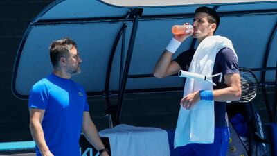 Serbia's Novak Djokovic takes a drink during a practice session on Rod Laver Arena. AP Photo