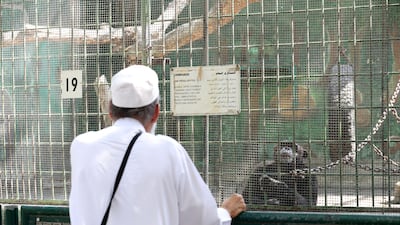 A man visits Dubai Zoo on its last day before closure to the public. The animals will be moved to Dubai Safari Park by year end. Chris Whiteoak / The National