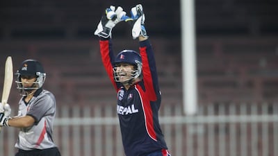 Wiki keeper Subash Khahurel plays for the Nepal Cricket team. The UAE played against Nepal at a cricket match at the Sharjah Cricket Stadium before their upcoming tournament in Bangladesh. Razan Alzayani / The National