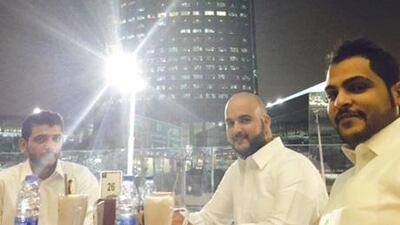 (From left) Sultan Al-Shammari, Sultan Al-Otaiba and Amer Al-Shammari relax on the terrace of the Al Masaa Cafe in downtown Riyadh. Sean Cronin for The National