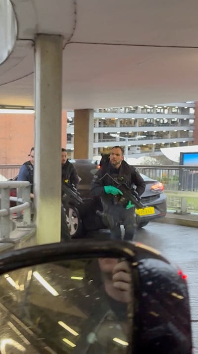 Police officers respond following an incident at Heathrow Airport, in London, on December 7, 2025. Reuters