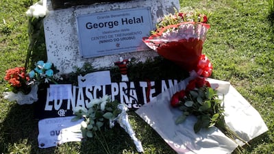 Flowers are seen in a tribute for the victims of the club's training center deadly fire in Rio de Janeiro, Brazil. REUTERS