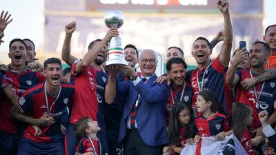 Cagliari coach Claudio Ranieri and his players celebrate being promoted to Serie A on June 8, 2023. AP