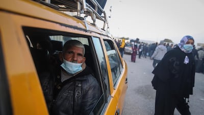 A Palestinian traveller in a taxi waits at the Rafah border crossing. Bloomberg