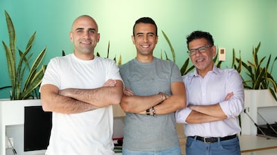 From left, Fares Ghandour, Aymane Sennoussi and Naif Al Mutawa are co-founders of Tuhoon. Pawan Singh / The National.