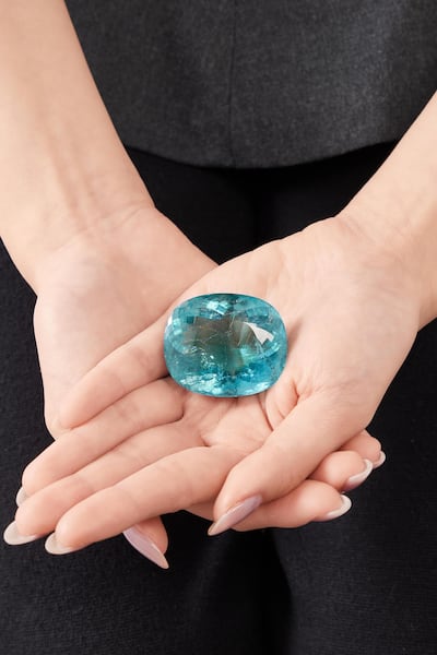 A cushion-shaped paraíba-type tourmaline weighing 199.73 carats is being sold as part of the 'Materiality' auction in Abu Dhabi. Photo: Sotheby's