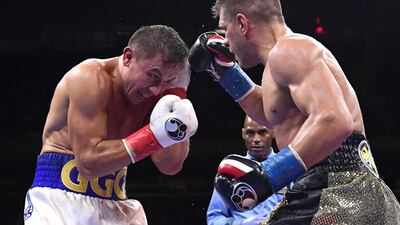 Gennady Golovkin, left, exchanges punches with Sergiy Derevyanchenko during their IBF middleweight title bout at Madison Square Garden. AFP