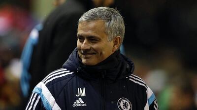 Chelsea manager Jose Mourinho smiles before the League Cup semi-final first-leg match against Liverpool last Tuesday. Jon Super / AP / January 20, 2015