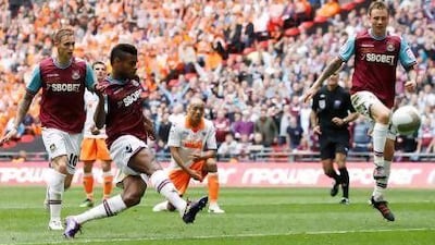 Ricardo Vaz Te, second left, fires in the 87th-minute winner that clinched West Ham's place back in the Premier League. Andrew Boyers / Action Images