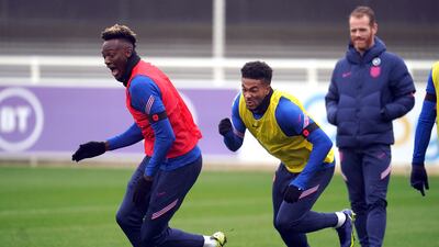 England's Tammy Abraham and Reece James, right, train on Thursday. PA