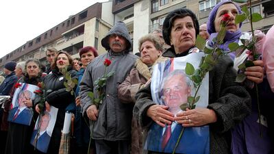 Supporters of Milosevic mourn their idol as they line the route of the funeral procession on March 18, 2006, in Pozarevac, Serbia and Montenegro. He died in his prison cell in The Hague while being tried for crimes against humanity. Getty Images