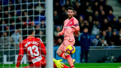 Lionel Messi watches his attempt on goal get saved. AP Photo