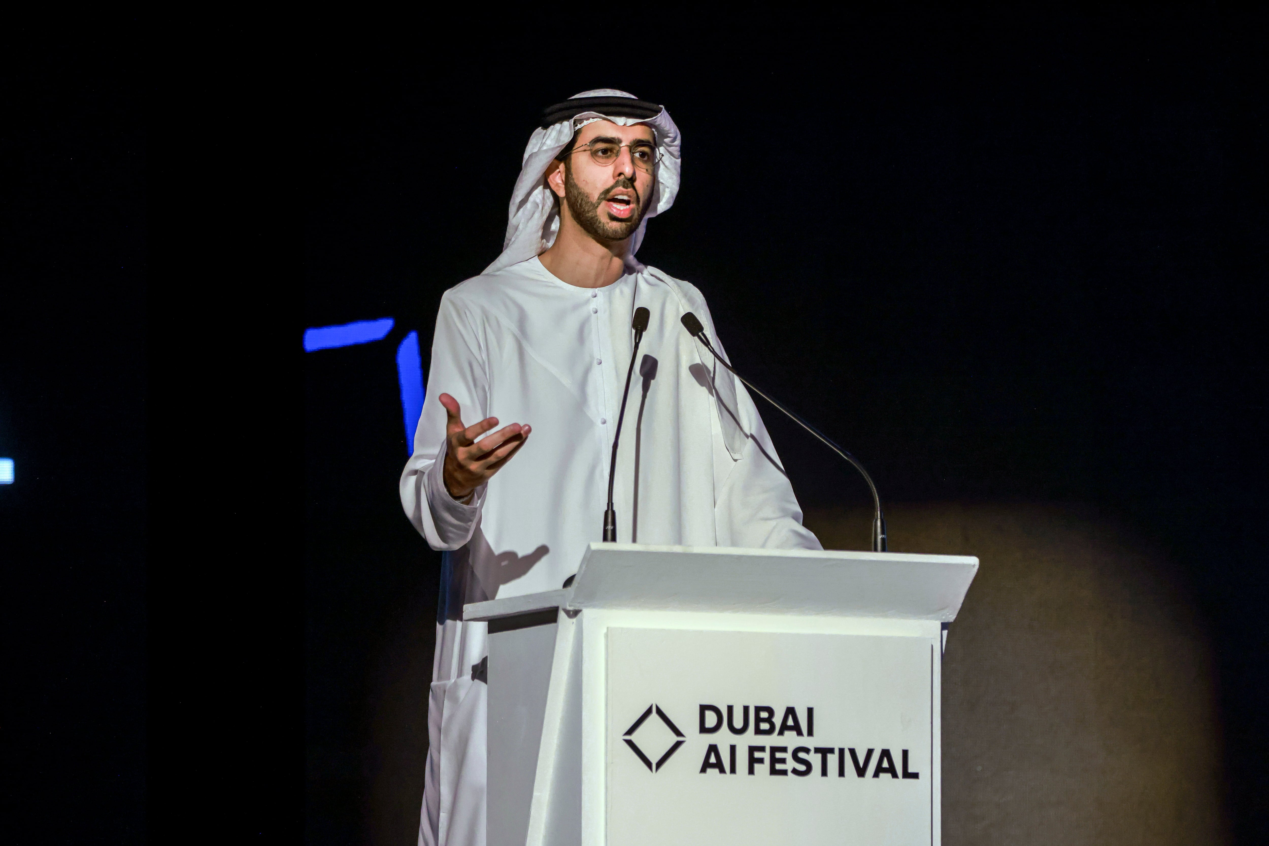Omar Al Olama, Minister of State for AI, Digital Economy and Remote Work Applications addresses the Dubai AI Festival. Victor Besa / The National