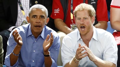 Prince Harry and former US president Barack Obama watch a wheelchair basketball event during the Invictus Games in Toronto, Canada, in September 2017. Reuters