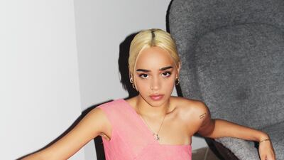 French-Iranian DJ Parvane Barret wearing Rami Al Ali couture at home. Rami Al Ali