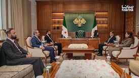 Syrian President Ahmad Al Shara, centre left, receives Mazloum Abdi, head of the SDF, centre right, in Damascus. Sana