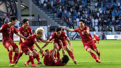 Vietnamese players celebrate their success.