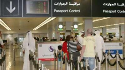 Passengers at Dubai International departures: the terminal expects foot traffic to slow in the coming year.