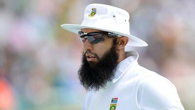 Hashim Amla of South Africa makes history on July 16, 2014 when he becomes South Africa's first permanent non-white skipper, taking over a team in transition after the retirements of Test greats Graeme Smith and Jacques Kallis. AFP PHOTO / LUIGI BENNETT