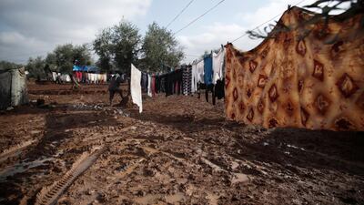 Location: Al-Karama camp in Atama. The aftermath of heavy rainfall on north Syria, residents lost their furniture, clothes and bedding as well as the tents waiting outside in open lands until the civil defense and NGs arrive to rescue them.