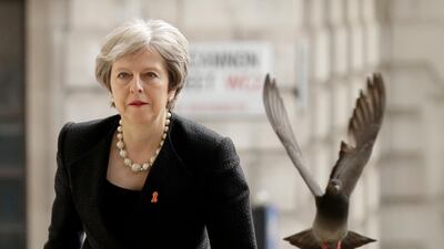 May, pictured here in April 2018, says she will step down as Conservative leader on June 7, 2019. AP Photo