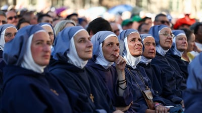Nuns wait for Pope Leo to arrive at Notre-Dame Cathedral. Getty Images