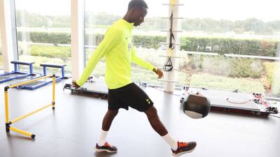 Pape Matar Sarr of Tottenham Hotspur kicks a ball. Getty Images
