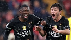 Ousmane Dembele (L) of PSG celebrates with teammate Joao Neves after scoring his second goal during the UEFA Champions League quarter-finals, 2nd leg match Liverpool FC against Paris Saint-Germain, in Liverpool, Britain, 14 April 2026. EPA / ADAM VAUGHAN