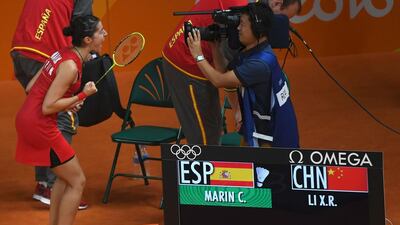 Spain's Carolina Marin reacts after winning against China's Li Xuerui during their women's singles semi-final badminton. (AFP)