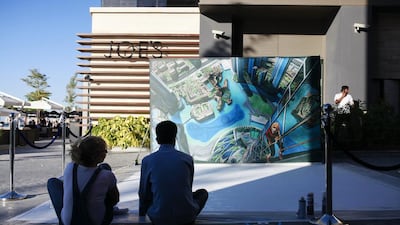 Artist Tracy Lee Stum observes her 3D art piece. Sarah Dea / The National