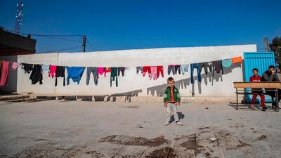 Internally displaced Syrians are pictured at a school turned into a makeshift camp in the northern Syrian city of Hasakeh. AFP