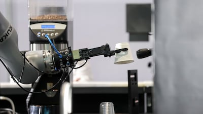 Artificial intelligence is expected to contribute up to 14 per cent to the UAE's gross domestic product — equivalent to $97.9 billion — by 2030. Khushnum Bhandari / The National