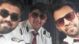 Capt Smit Machchhar, left, with friend and colleague Dharav Gosalia, right, and another colleague on a SpiceJet flight some years ago. Dharav Gosalia