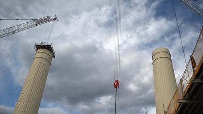 Battersea Power Station's legendary chimneys loom over London. Shafi Musaddique / The National