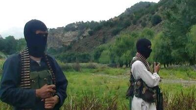 Pakistani Taliban stand alert in their stronghold of Shawal in the Pakistani tribal region of South Waziristan. Stepped-up US drone strikes, Pakistani military offensives and dwindling cash reserves have driven out many of the Arabic-speakers in recent years,