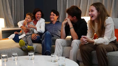 Canadian Prime Minister Justin Trudeau watches election results with wife and children. AFP