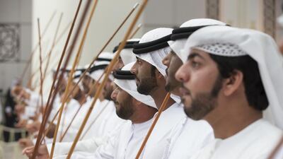 Men perform a traditional ayyalah dance. Ryan Carter / Crown Prince Court - Abu Dhabi