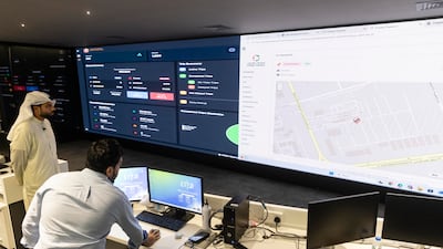 Large screens in the operations room show every bus in the fleet and monitor their journeys live