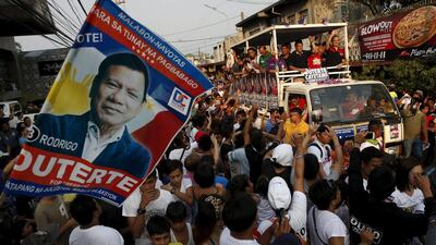 Philippines presidential candidate Rodrigo “Digong” Duterte on the campaign trail in Malabon, Metro Manila. He has been accused of hiding millions of pesos in secret bank accounts. Erik De Castro / Reuters.