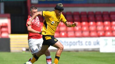 Wolverhampton Wanderers' Raul Jimenez goes past Crewe Alexandra's Oli Finney during a pre-season friendly match at Mornflake Stadium on Saturday, July 17.