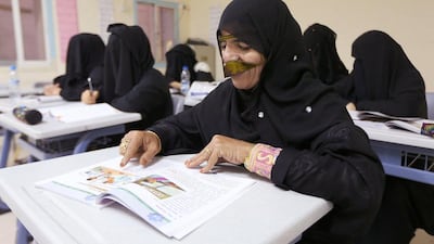 Sendeah Al Kindi studies English during a class at the Umm Al Mumineen Adult Education Centre in Fujairah. Pawan Singh / The National