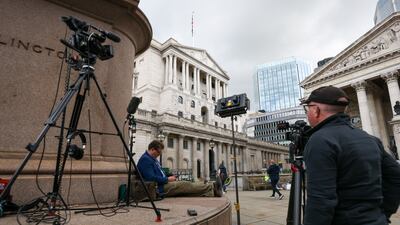 News crews set up outside the Bank of England in London on Thursday, as it raised its benchmark lending rate to the highest level since 2008. Bloomberg