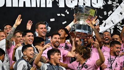 Lionel Messi and his Inter Miami teammates celebrate with the trophy after winning the Leagues Cup. AFP