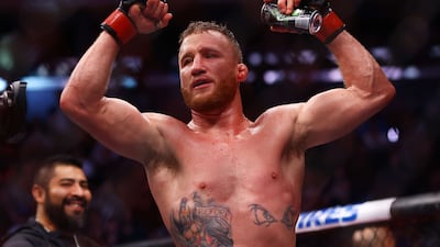 Justin Gaethje celebrates after his decision victory over Michael Chandler in their lightweight bout at UFC 268 on November 06, 2021 in New York City. AFP