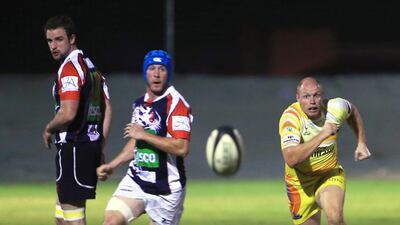 A ball bounces loose during the clash between Jebel Ali Dragons and Dubai Hurricanes, which was won 26-24 by the Hurricanes. Ravindranath K / The National